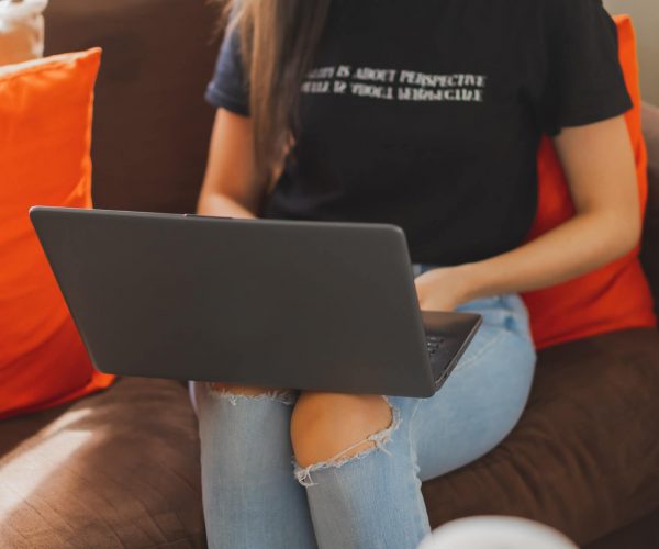 Women using black laptop